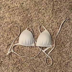 Tan cross back bikini top.